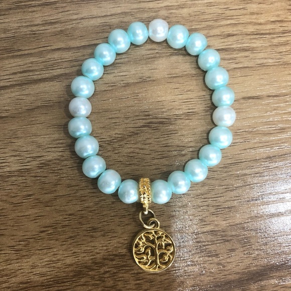 Three beaded bracelets with pendants - Picture 2 of 4